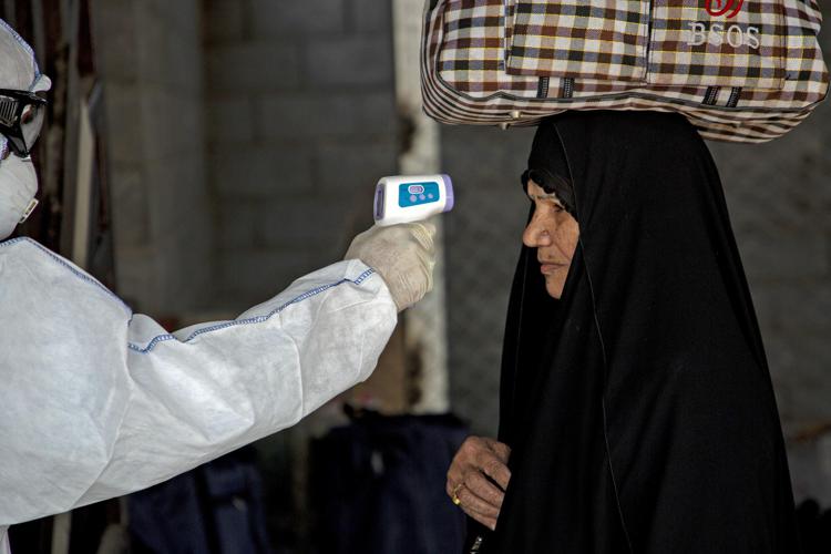 Controlli Coronavirus in Iran (Photo by Hussein FALEH / AFP)