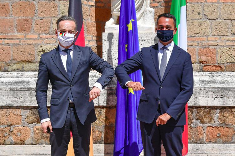Italy's foreign minister Luigi Di Maio (R) with German counterpart Heiko Maas (L)
