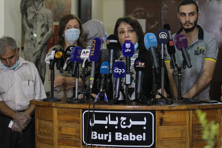 Un momento della conferenza stampa per chiedere la liberazione di Hella Mewis (Foto Afp)
