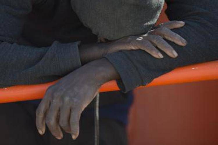 Un migrante