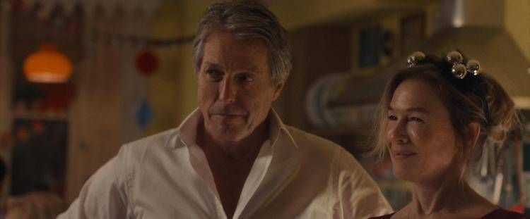 (da sinistra) Daniel Cleaver (Hugh Grant) e Bridget Jones (Renée Zellweger) in 'Bridget Jones: Mad About the Boy', diretto da Michael Morris - © 2025 Universal Studios. All Rights Reserved