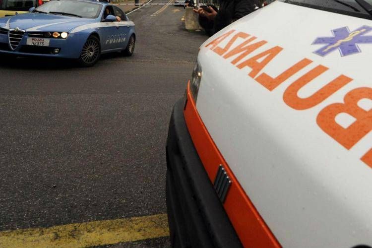 Polizia e ambulanza - Fotogramma