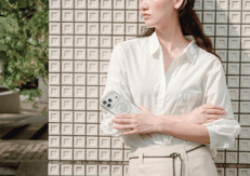 Crystelle shimmers with delicate glitter and a pearly shell glow, a luminous ode to light drifting between sea and sky