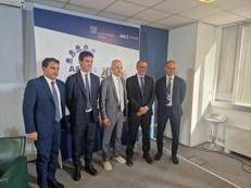 Il presidente di Confindustria Marche, Roberto Cardinali (al centro) nel corso del confronto con i candidati alla presidenza della regione