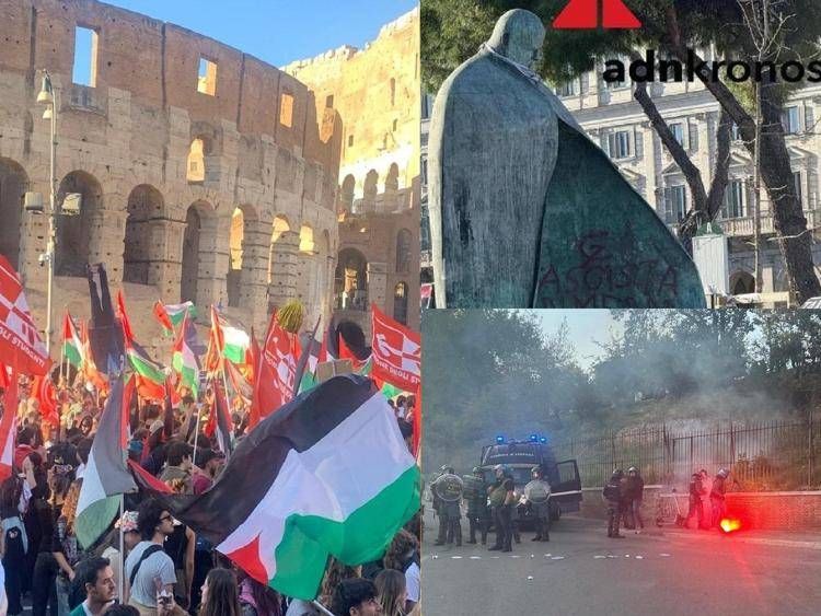 Corteo pro Pal a Roma, la statua  di Wojtyla imbrattata e la guerriglia tra incappucciati e forze dell'ordine