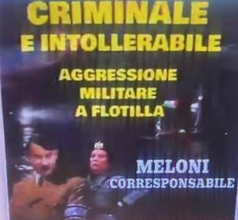 Al corteo di Milano fotomontaggio choc con Meloni vestita da gerarca nazis