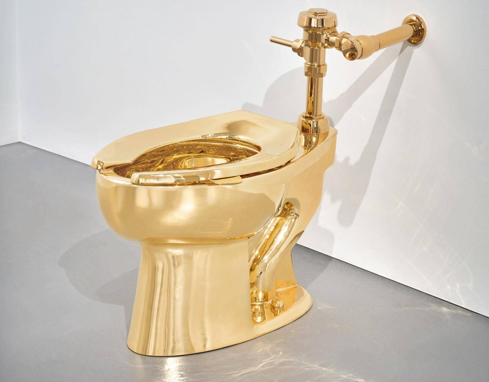 Cattelan’s golden toilet flies to auction, ‘America’ sold for 12.1 million dollars