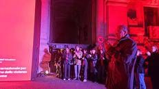 Ministero dell'Istruzione e del Merito illuminato di rosso per giornata internazionale contro violenza su donne