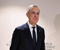 Mark Carney diventa l'idolo degli anti-Trump a Davos (e Lutnick riceve fischi)