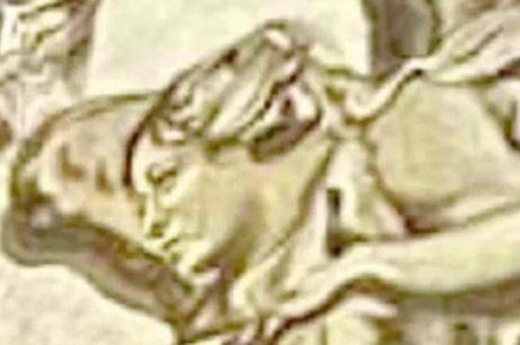 Il dettaglio sul volto di un cherubino dipinto in un affresco della Basilica di San Lorenzo in Lucina, somigliante alla premier Giorgia Meloni