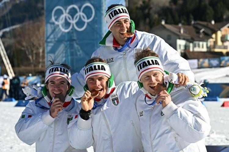 Davide Graz, Elia Barp, Martino Carollo e Federico Pellegrino bronzo nella staffetta sci fondo uomini - (Afp)