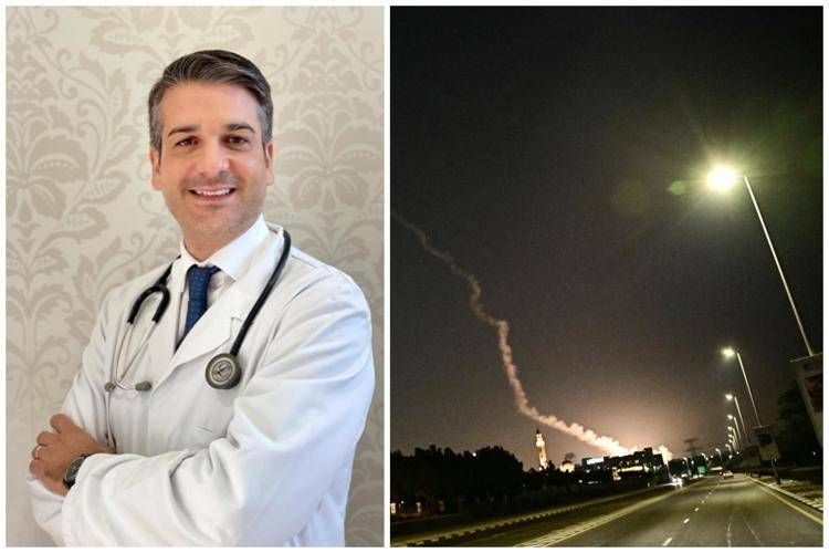 Giovanni Leonetti e un'immagine del cielo di Dubai lo scorso 28 febbraio - Afp