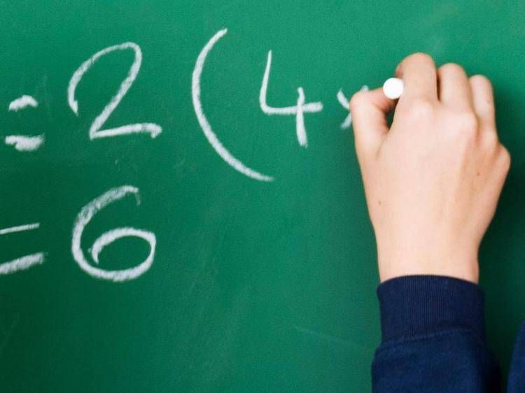 Insegnante alla lavagna (Foto )