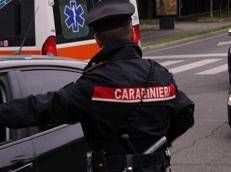 Un'ambulanza e carabinieri - (Ipa)