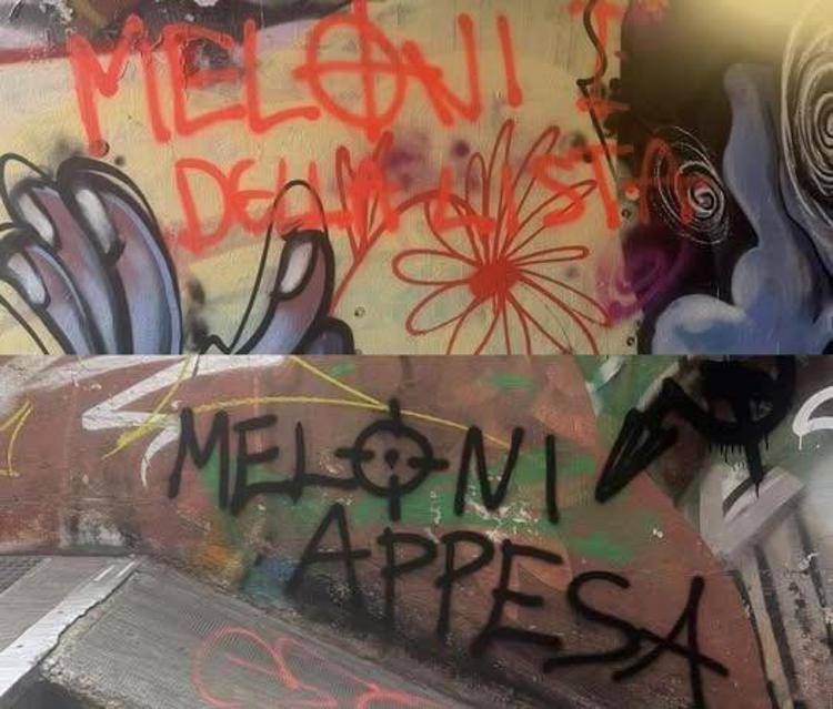 Le scritte  con minacce a Meloni
