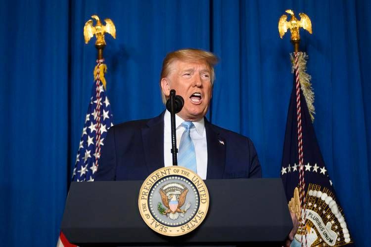 US President Donald Trump makes a statement on Iran at the Mar-a-Lago estate in Palm Beach Florida, on January 3, 2020. - President Donald Trump said on January 3, 2020 that America does not seek war or regime change with Iran, less than a day after the US launched an airstrike in Baghdad that killed Iran’s top general, Qasem Soleimani. (Photo by JIM WATSON / AFP) - AFP