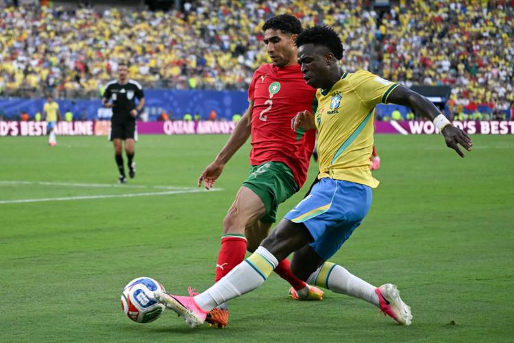 Hakimi e Vinicius - Afp