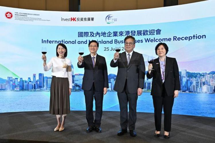 Hong Kong SAR's Chief Executive, John Lee (2nd left); Secretary for Commerce and Economic Dev., Algernon Yau (2nd right);Director of the Chief Executive's Office, Carol Yip (1st left);Director-General of Investment Promotion, Alpha Lau (1/st right),