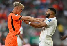 Van Hecke e Saibari - Afp
