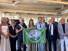 Un momento della cerimonia di consegna delle Bandiere verdi dei pediatri alle località balneari amiche dei più piccoli (Foto Italo Farnetani)