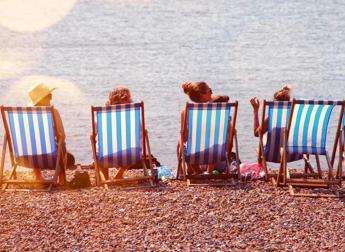 Donne sulla spiaggia - (Foto)