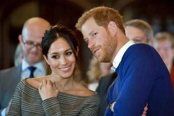 (FILES) In this file photo taken on January 18, 2018 Britain's Prince Harry and his fiancée US actress Meghan Markle watch a dance performance by Jukebox Collective during a visit at Cardiff Castle in Cardiff, south Wales on January 18, 2018, for a day showcasing the rich culture and heritage of Wales.
Meghan Markle once struggled for roles but the US actress has now landed the biggest part of all as she prepares to marry Prince Harry on May 19, 2018 and become the newest face in Britain's royal family. / AFP PHOTO / POOL / Ben Birchall - AFP