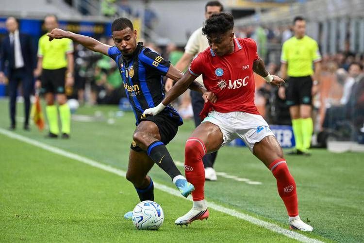 Diouf e Alisson Santos - Afp