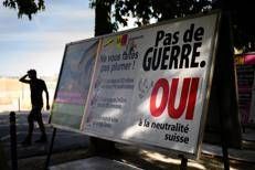 Cartellone elettorale per il referendum in Svizzera - Afp