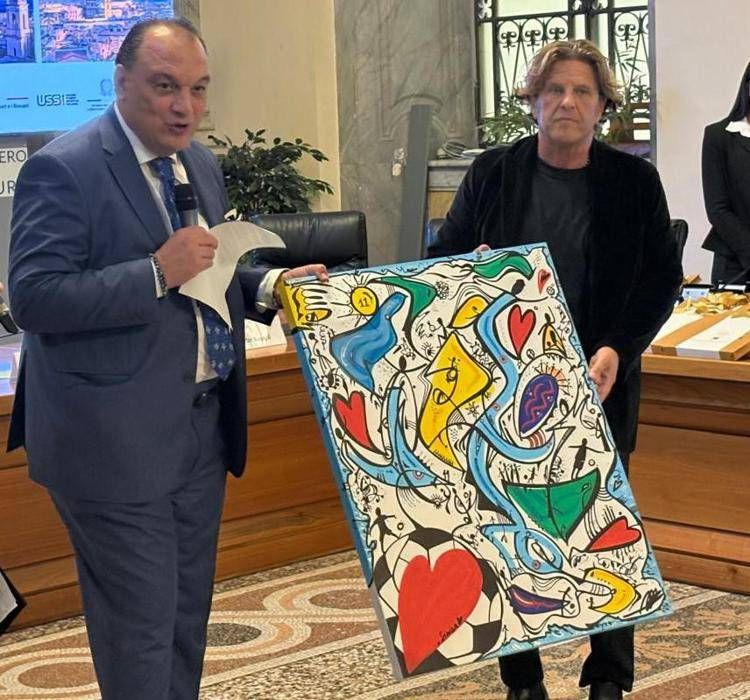 Benito Macerata con l'opera per Mihajlovic - Adnkronos