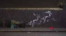Il Babbo Natale di Banksy è un senzatetto