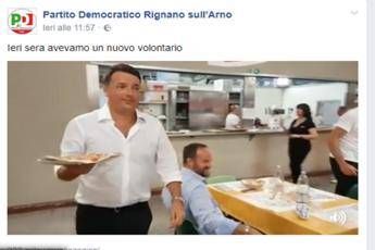 Renzi fa il cameriere alla Festa dell'Unità Renzi fa il cameriere alla Festa dell'Unità