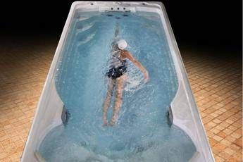 Jacuzzi protagonista a Cortina con piscina Swimspa in finish area Jacuzzi protagonista a Cortina con piscina Swimspa in finish area