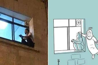 Mamma ha il Covid, figlio sul muro dell'ospedale tutte le sere Mamma ha il Covid, figlio sul muro dell'ospedale tutte le sere